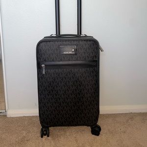 MK rolling suitcase